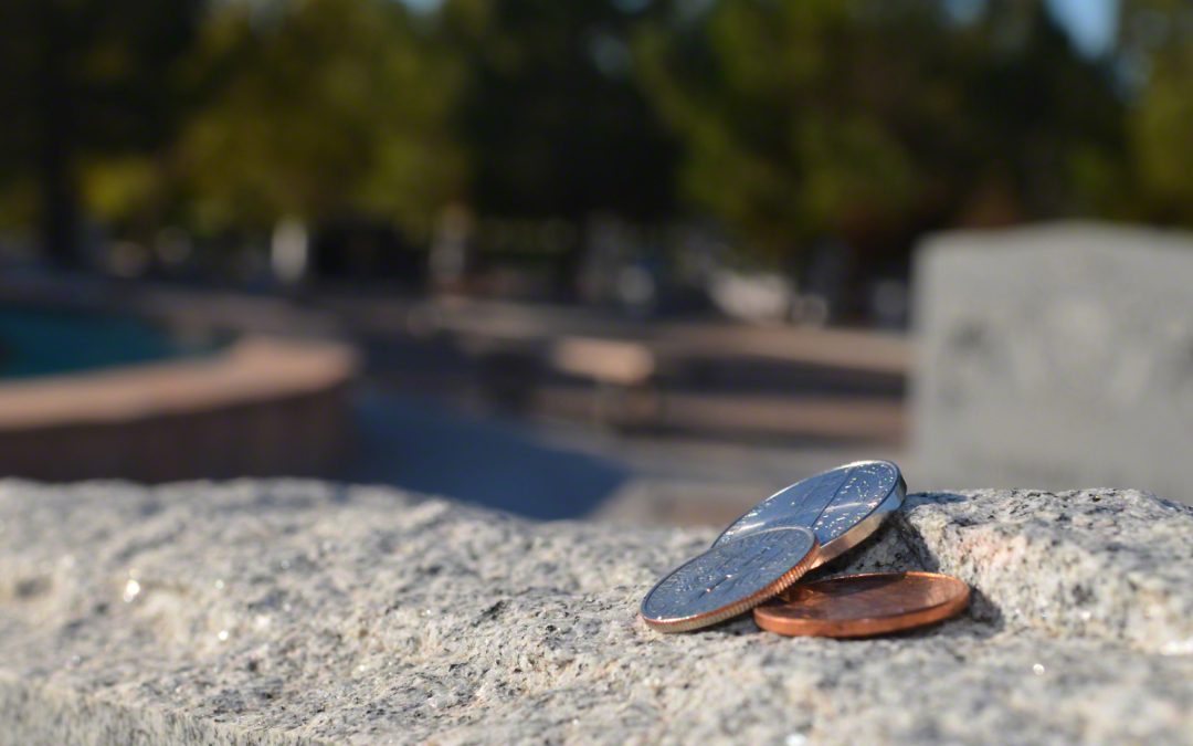 The Special Meanings of Coins on the Graves of Veterans