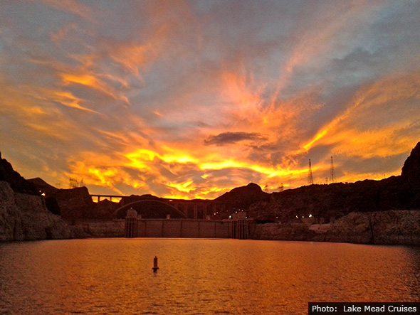 Sunset over Hoover Dam by Lake Mead Cruises