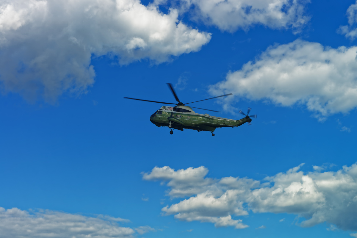 Military Helicopters Fly Into Town